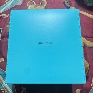 Tiffany & Co. Blue Leather Jewelry Box .